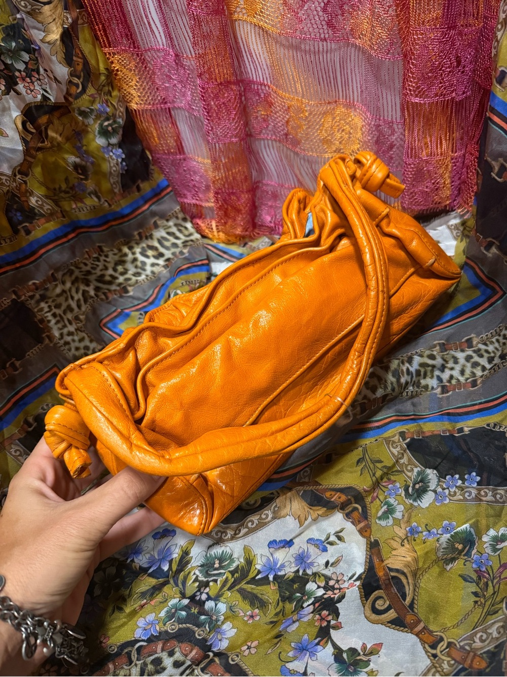 Orange Knot-Handle Leather Shoulder Bag from Sony picture costume dept